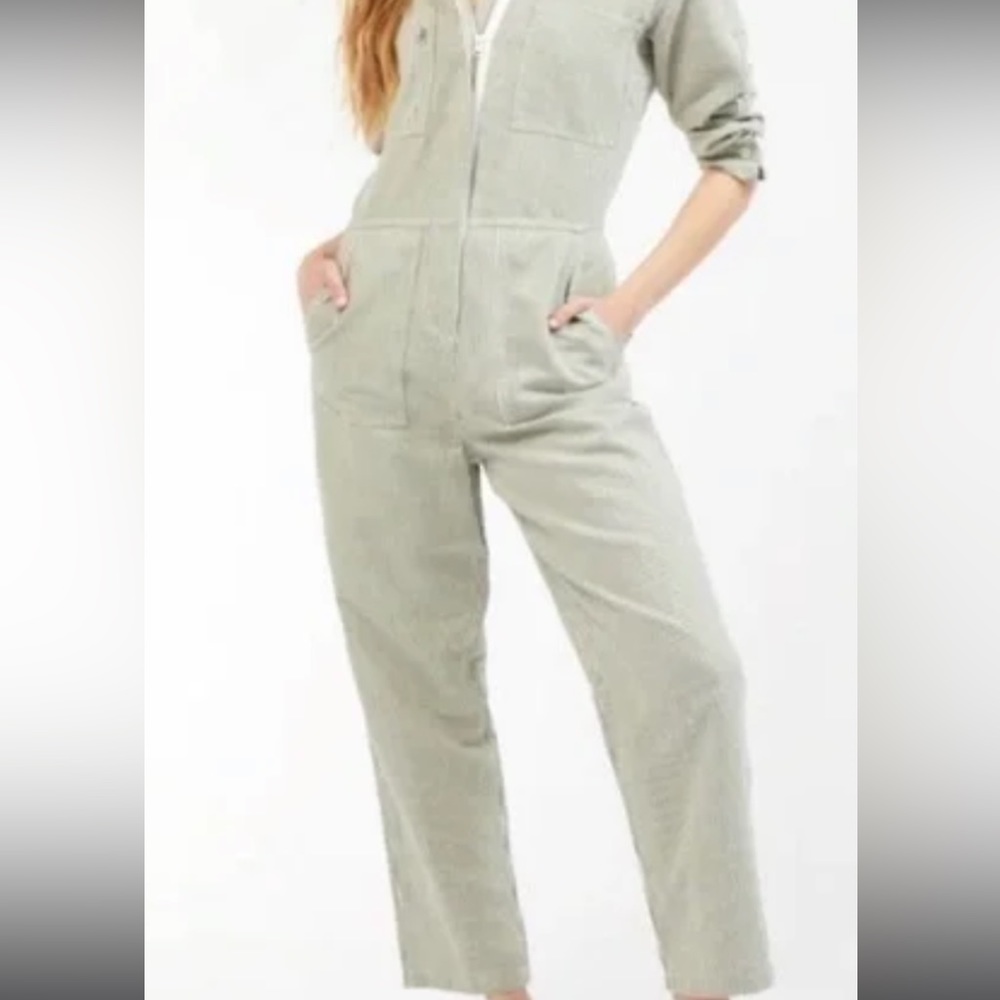 Outerknown Station Jumpsuit Green
Striped Size medium.